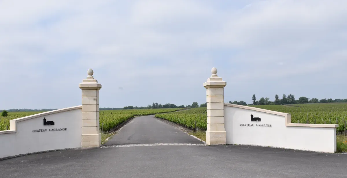 The gates of Château Lagrange in Saint-Julien-Beychevelle, seen on a Bordeaux wine day tour